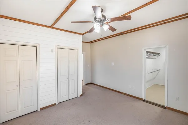 a view of a room with closet and wooden floor
