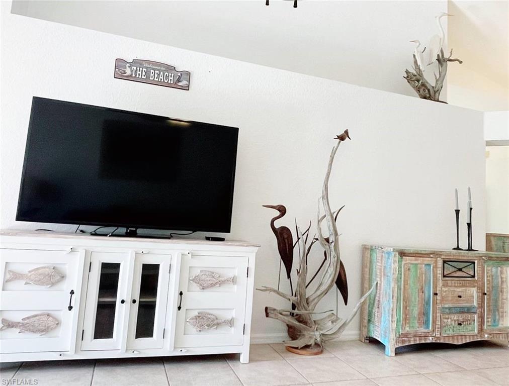 2037 West Crown Pointe Boulevard Naples, FL 34112 - Photo 14 of 24 a view of an empty room with windows