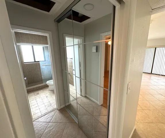 a view of balcony with wooden floor