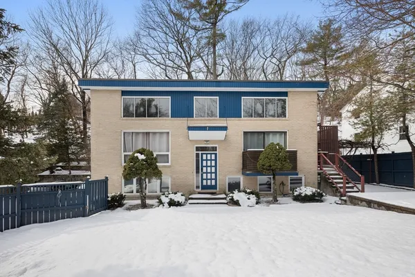 a view of house with outdoor space and porch
