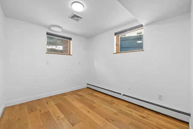 an empty room with a bench