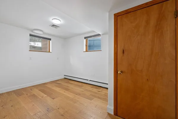 a bathroom with a sink a washer and dryer