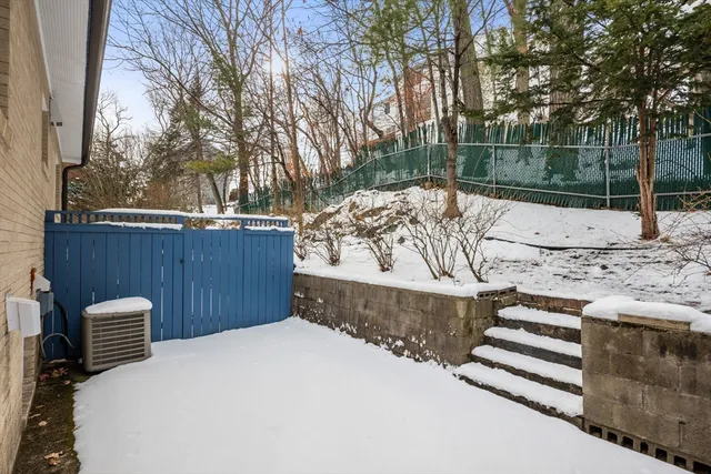 a view of street with a snow on the road