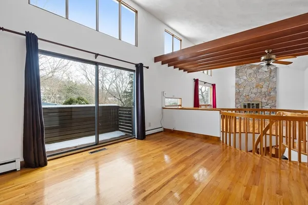 a view of livingroom with furniture and floor to ceiling window