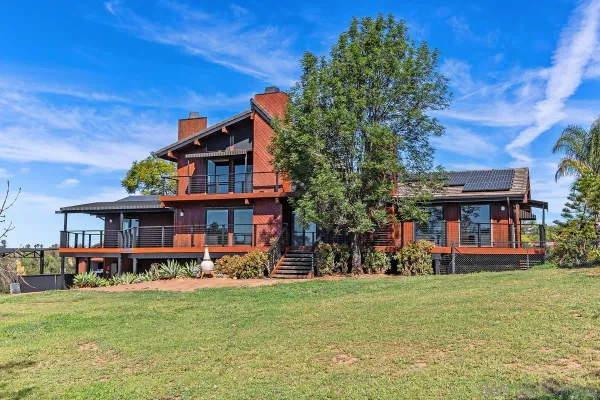 front view of a house with a big yard