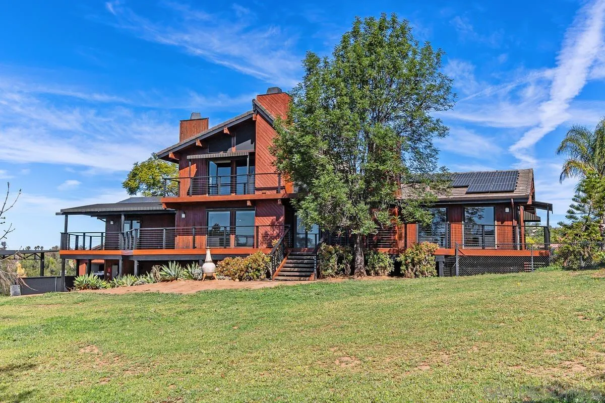 front view of a house with a big yard