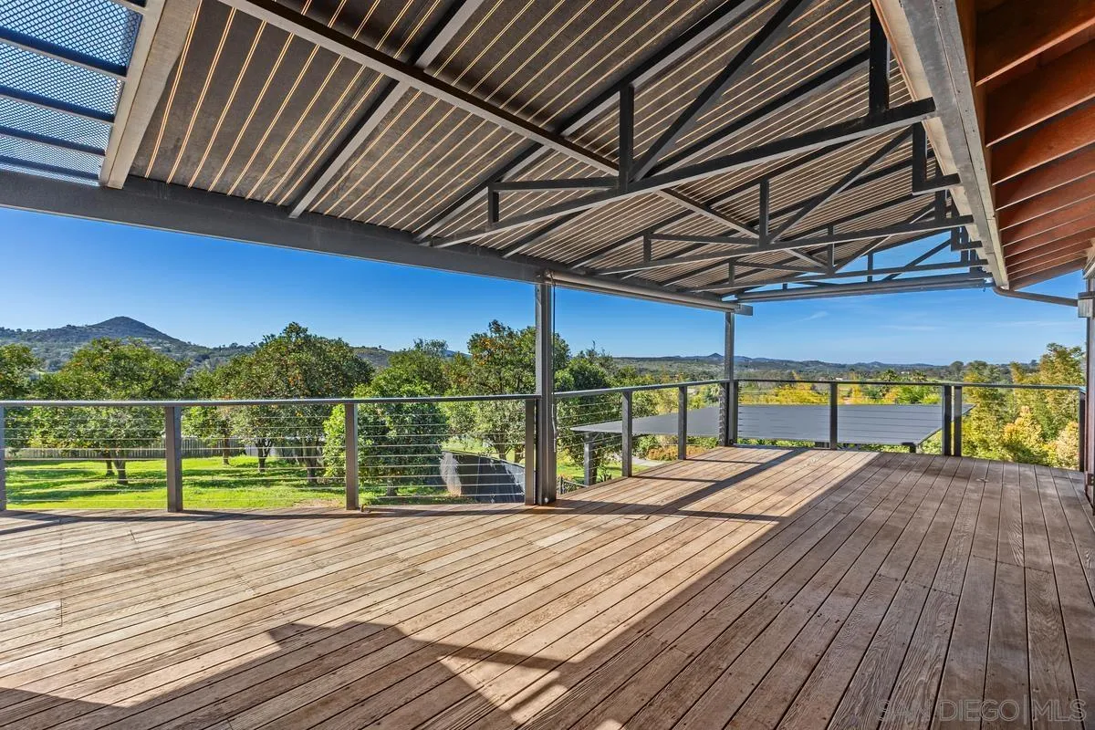 30830 Ranch Creek Road Valley Center, CA 92082 - Photo 23 of 50 a view of a balcony with wooden floor