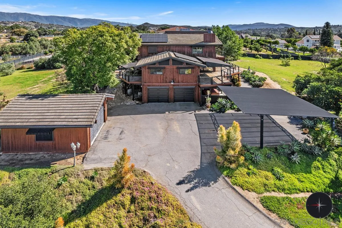30830 Ranch Creek Road Valley Center, CA 92082 - Photo 38 of 50 an aerial view of a house with a garden and lake view