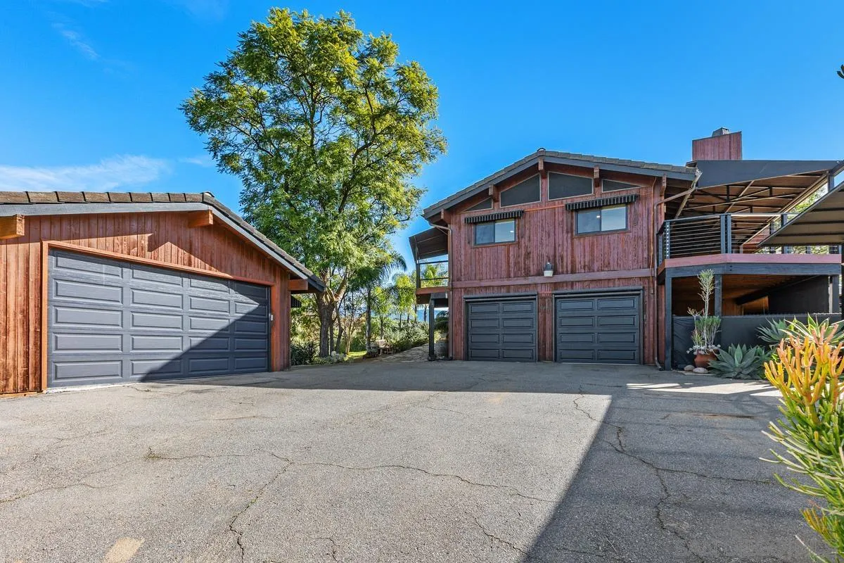 30830 Ranch Creek Road Valley Center, CA 92082 - Photo 40 of 50 a view of a house with a yard