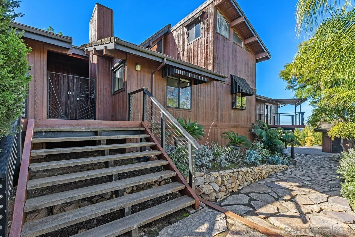 30830 Ranch Creek Road Valley Center, CA 92082 - Photo 42 of 50 a view of a house with backyard and deck
