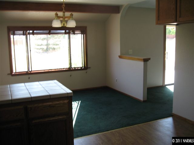 2849 Wade Street Minden, NV 89423 - Photo 10 of 13 a room with window and chandelier
