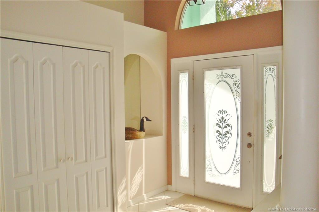 2209 Southwest Oak Ridge Road Palm City, FL 34990 - Photo 10 of 35 front hall closet