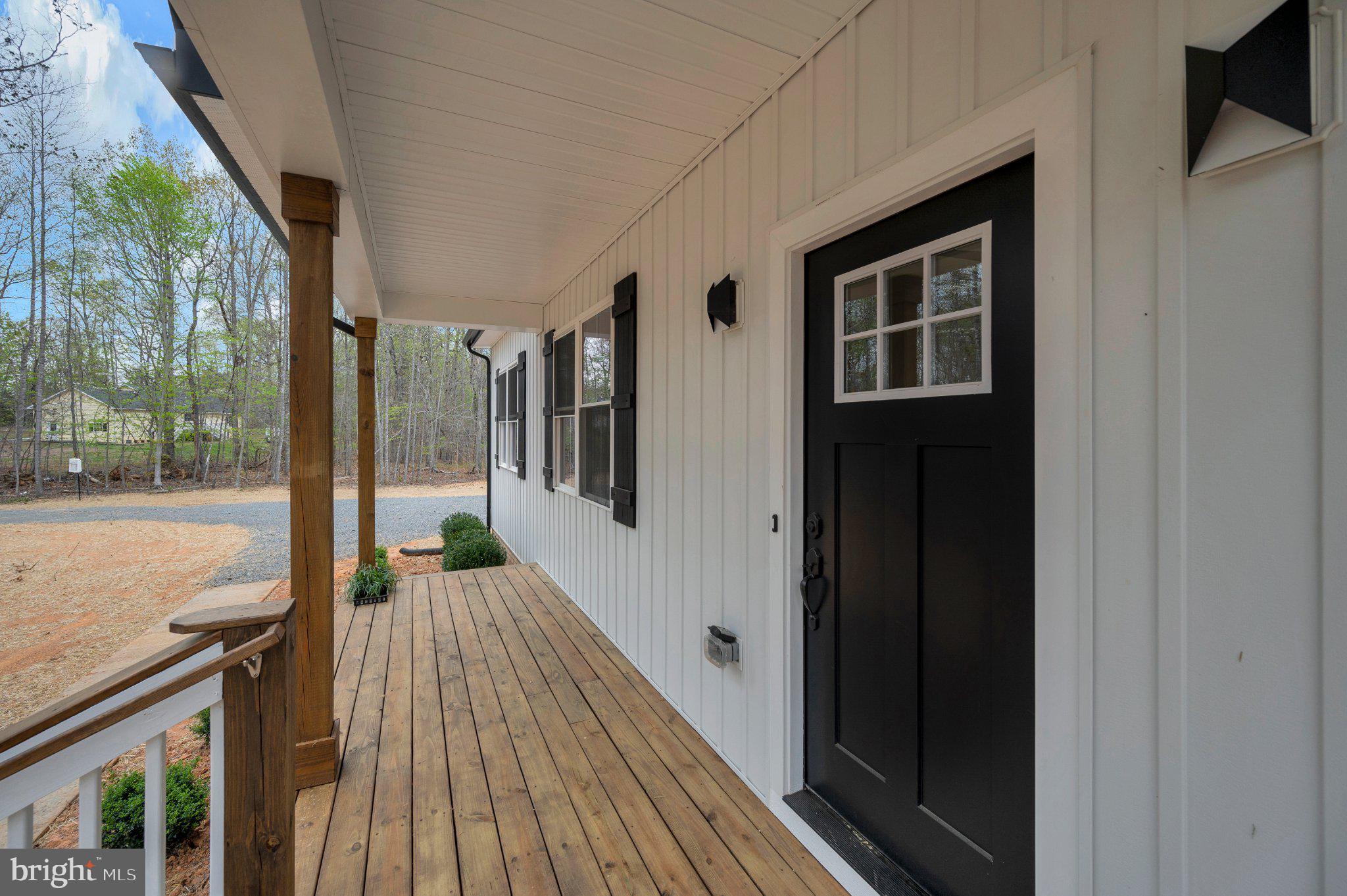 17342 Mallorys Ford Road Gordonsville, VA 22942 - Photo 16 of 38 a view of balcony and wooden floor