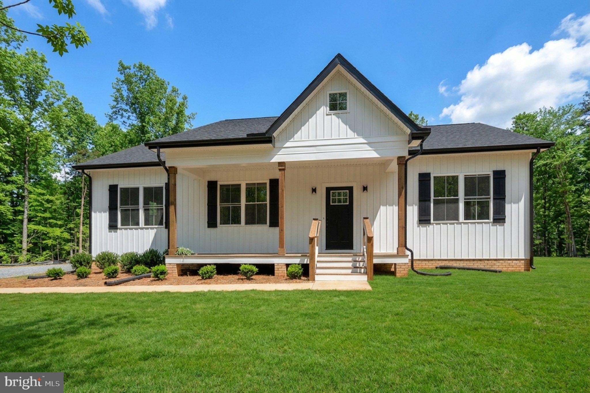 17342 Mallorys Ford Road Gordonsville, VA 22942 - Photo 2 of 38 a view of a house with backyard