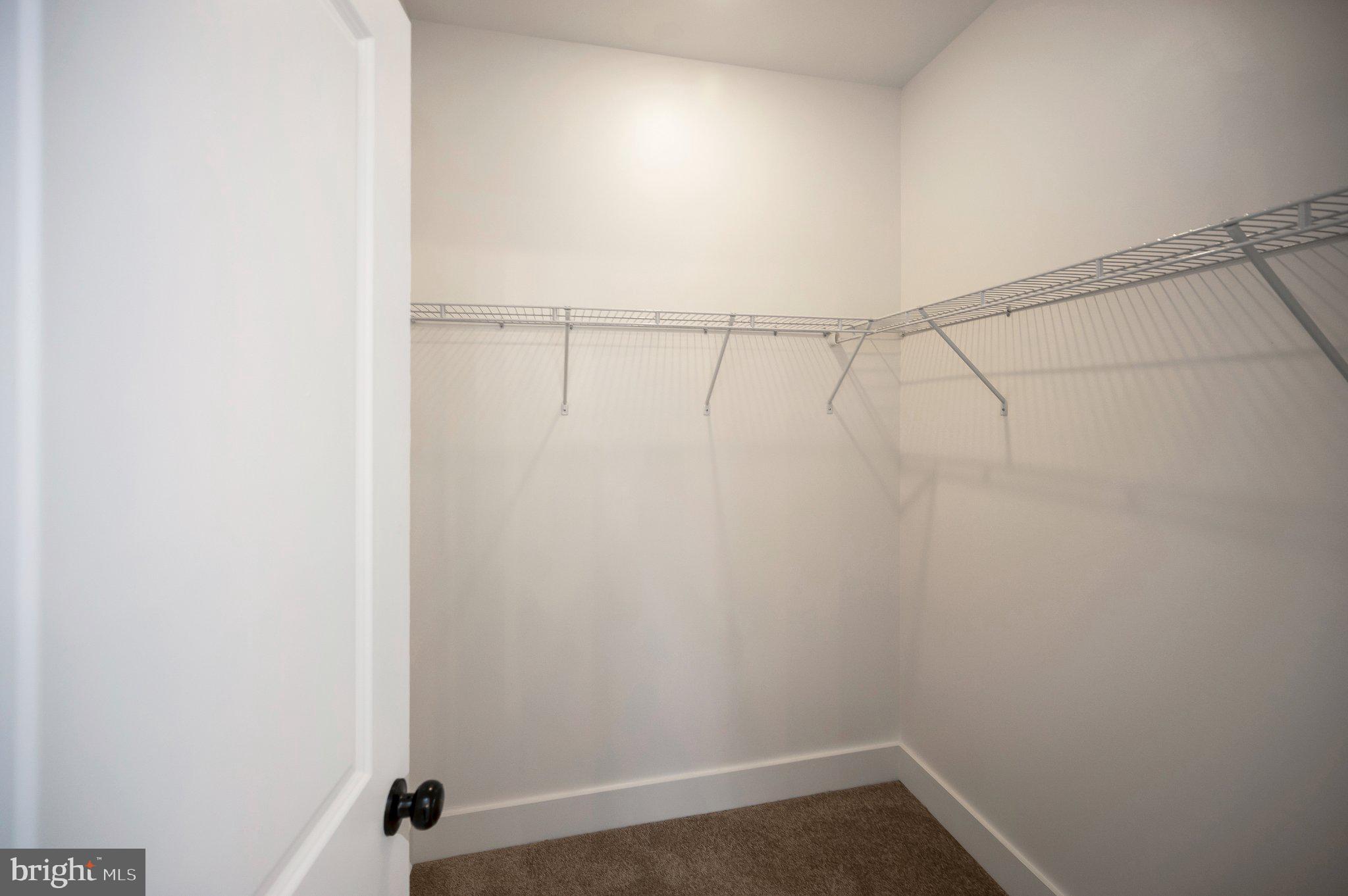 17342 Mallorys Ford Road Gordonsville, VA 22942 - Photo 32 of 38 a view of a room with racks on the wall