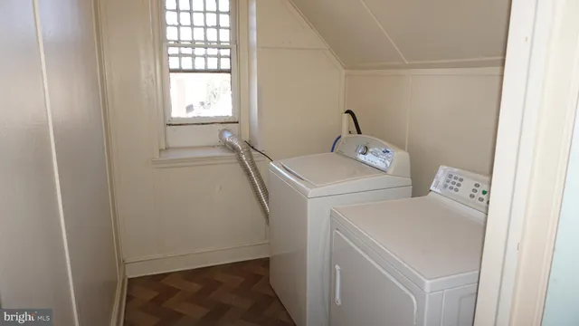 a utility room with dryer and washer