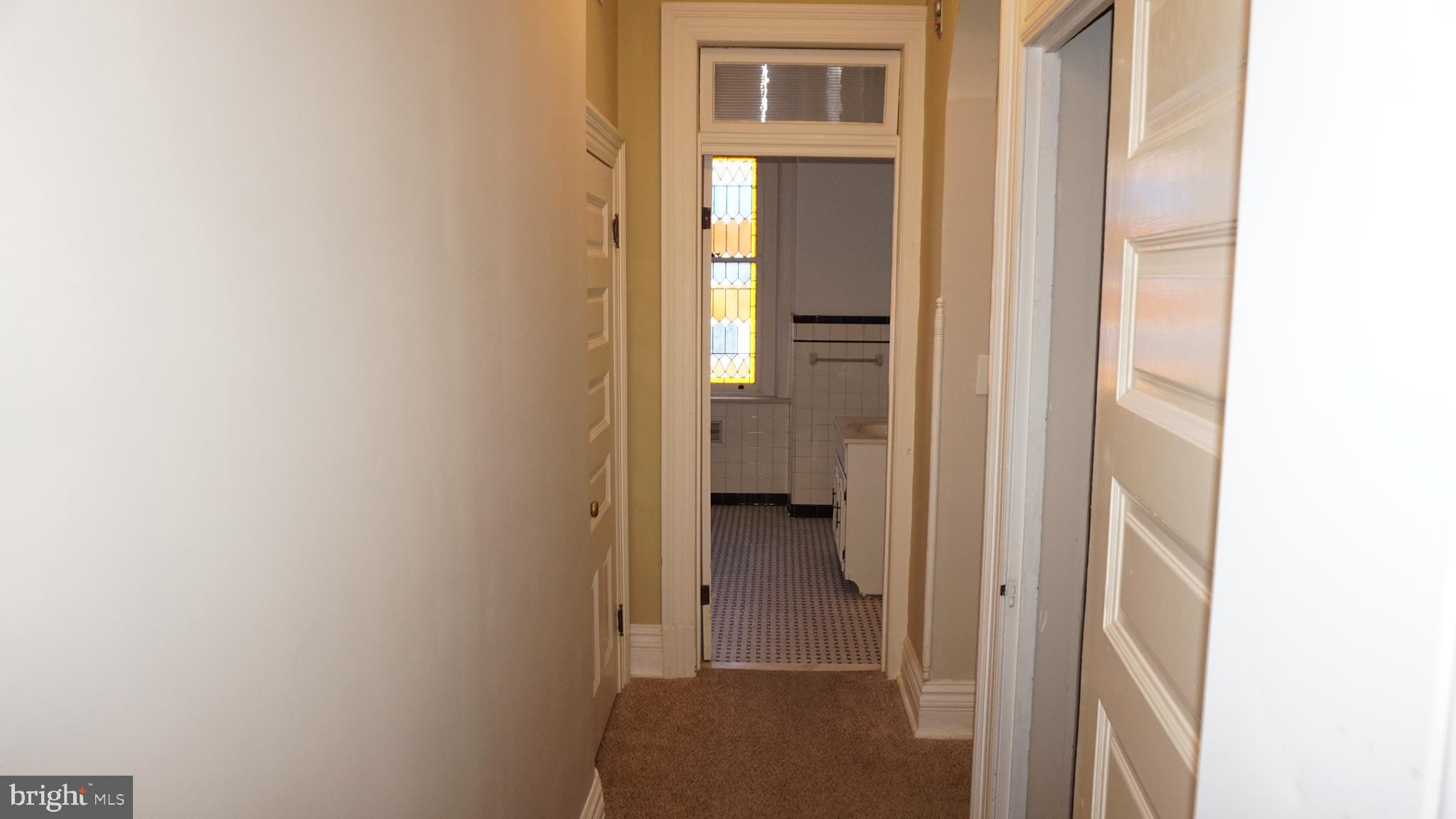 200 East Walnut Street, Unit 4 Hanover, PA 17331 - Photo 2 of 47 a view of a bathroom from a hallway