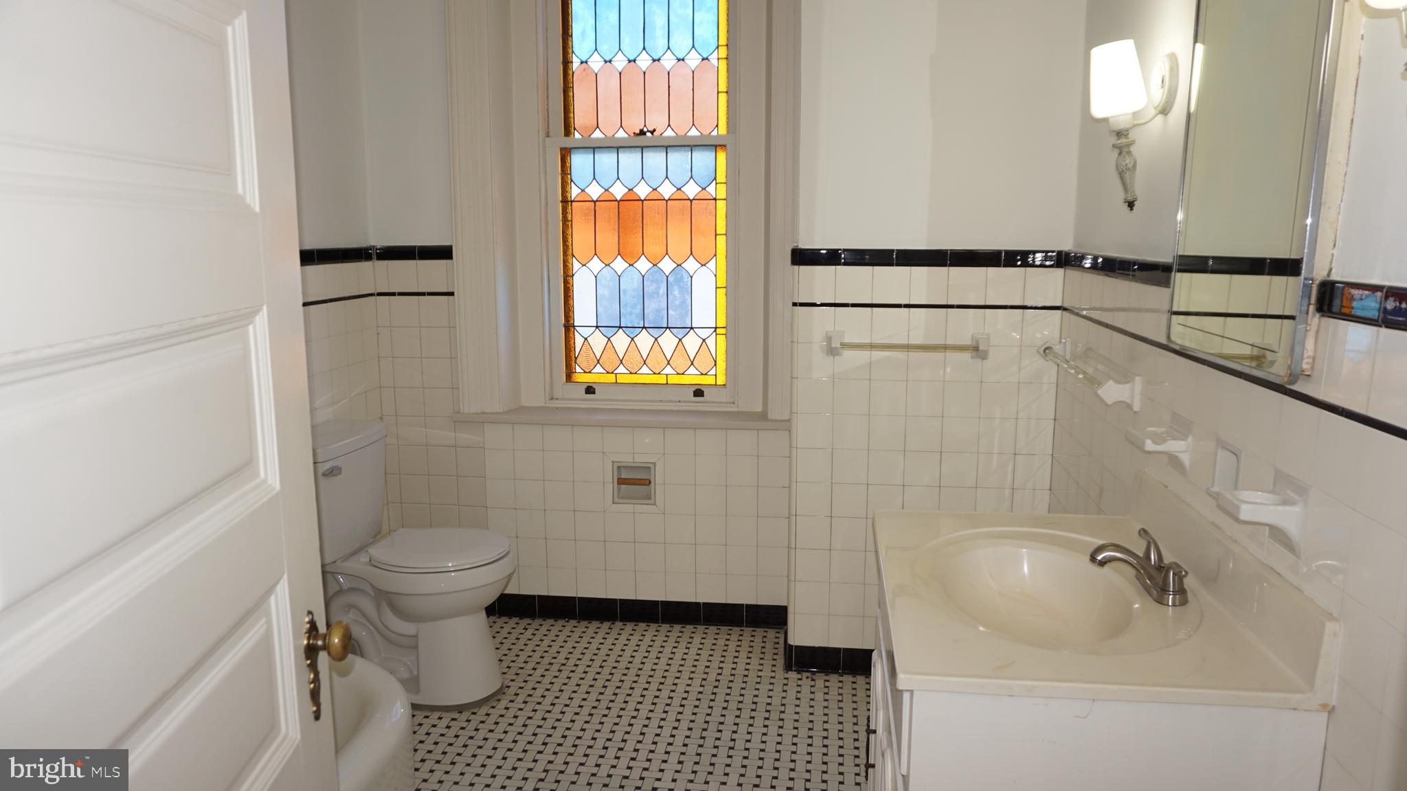 200 East Walnut Street, Unit 4 Hanover, PA 17331 - Photo 3 of 47 a bathroom with a sink toilet and shower