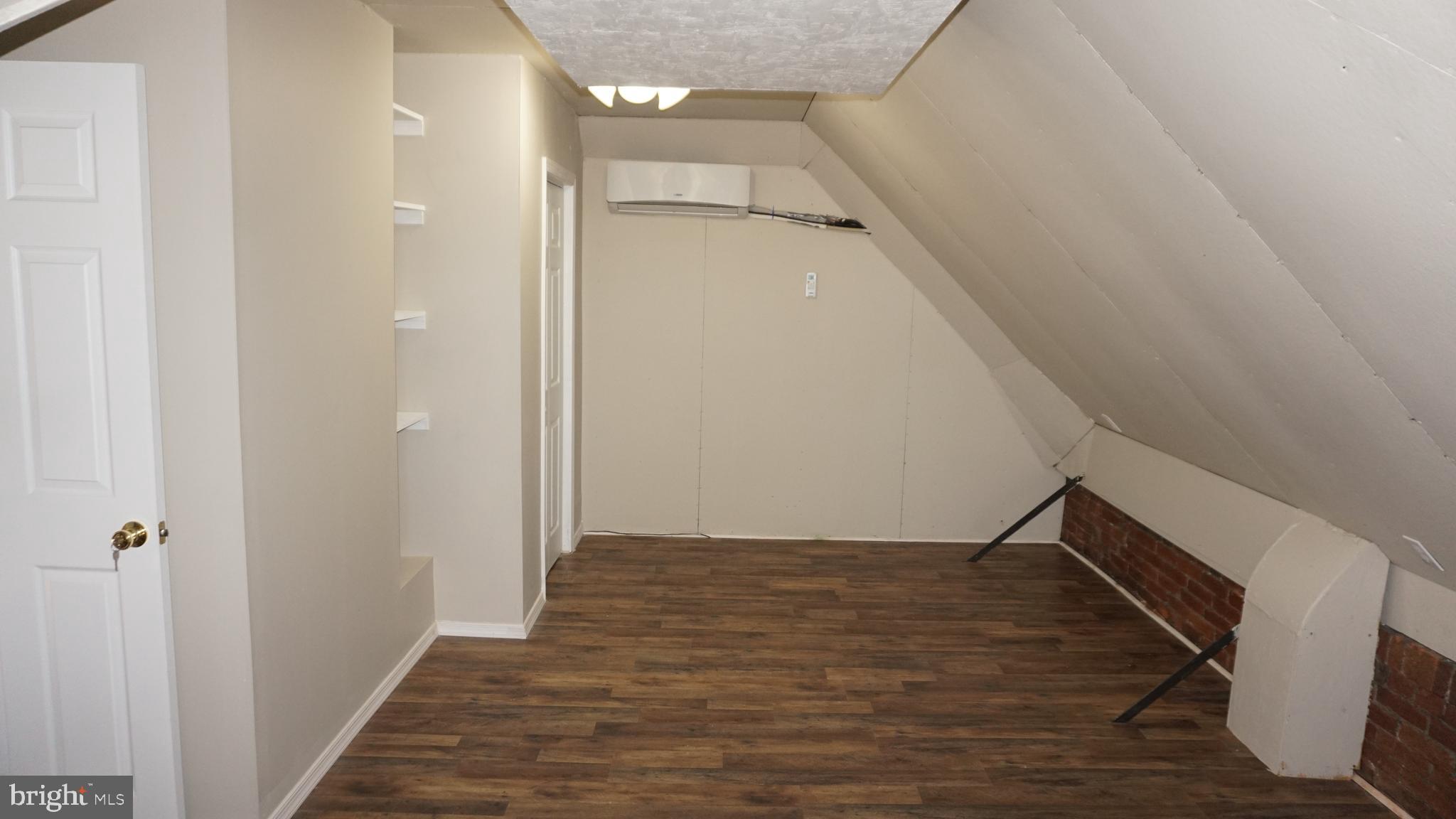 200 East Walnut Street, Unit 4 Hanover, PA 17331 - Photo 35 of 47 a view of hallway with stairs and wooden floor