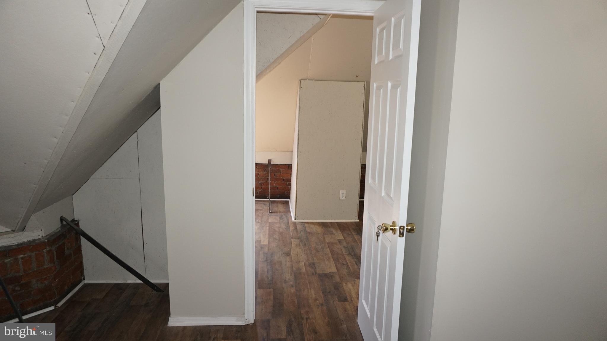 200 East Walnut Street, Unit 4 Hanover, PA 17331 - Photo 39 of 47 a view of a hallway with wooden floor and entryway