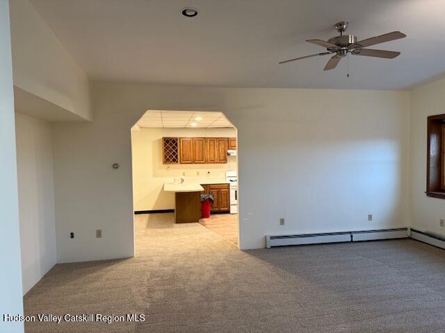 1112 Morton Boulevard, Unit 1 Kingston, NY 12401 - Photo 5 of 12 an empty room with a ceiling fan and window