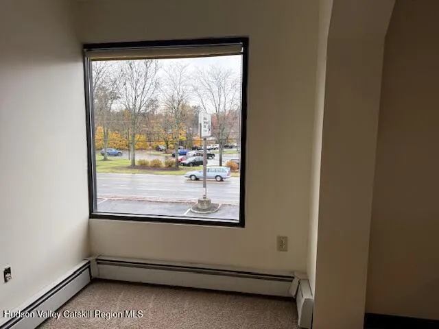 a view of lot of window and living room