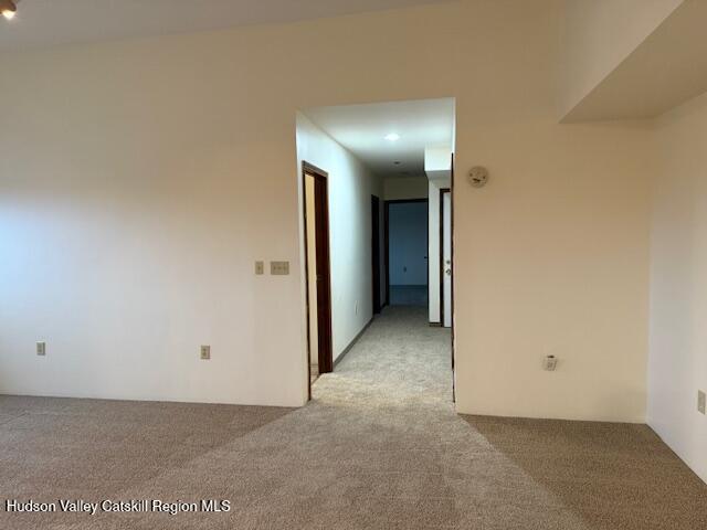 1112 Morton Boulevard, Unit 1 Kingston, NY 12401 - Photo 9 of 12 an empty room with closet and mirror