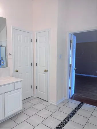 a view of a hallway with entryway