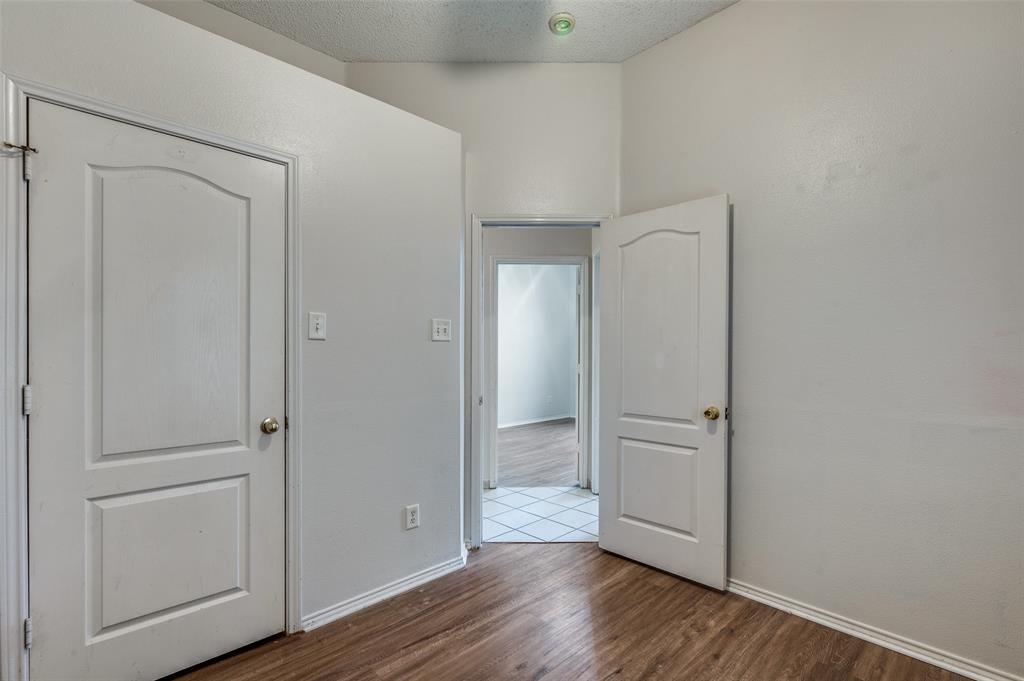 9120 River Trails Boulevard Fort Worth, TX 76118 - Photo 17 of 25 wooden floor with white walls