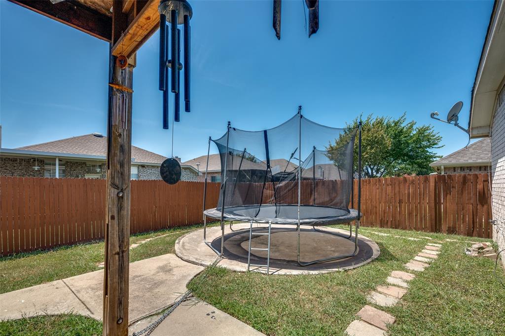 9120 River Trails Boulevard Fort Worth, TX 76118 - Photo 24 of 25 a swimming pool with outdoor seating and yard