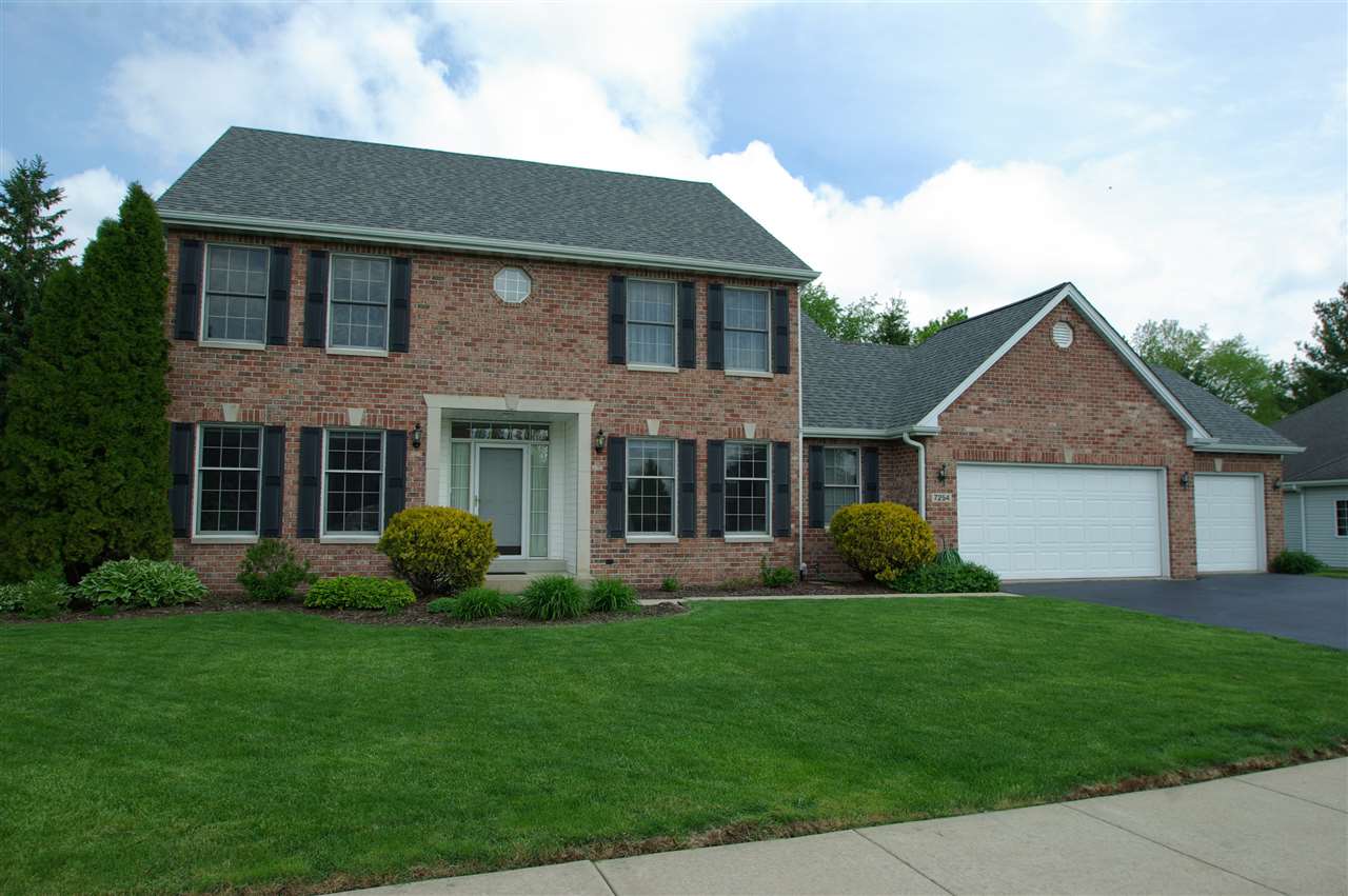 7254 Sentinel Road Rockford, IL 61107 - Photo 1 of 25 front view of a house with a yard