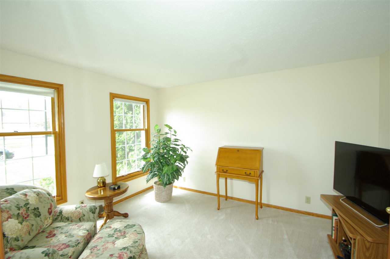 7254 Sentinel Road Rockford, IL 61107 - Photo 12 of 25 a bedroom with furniture and a window