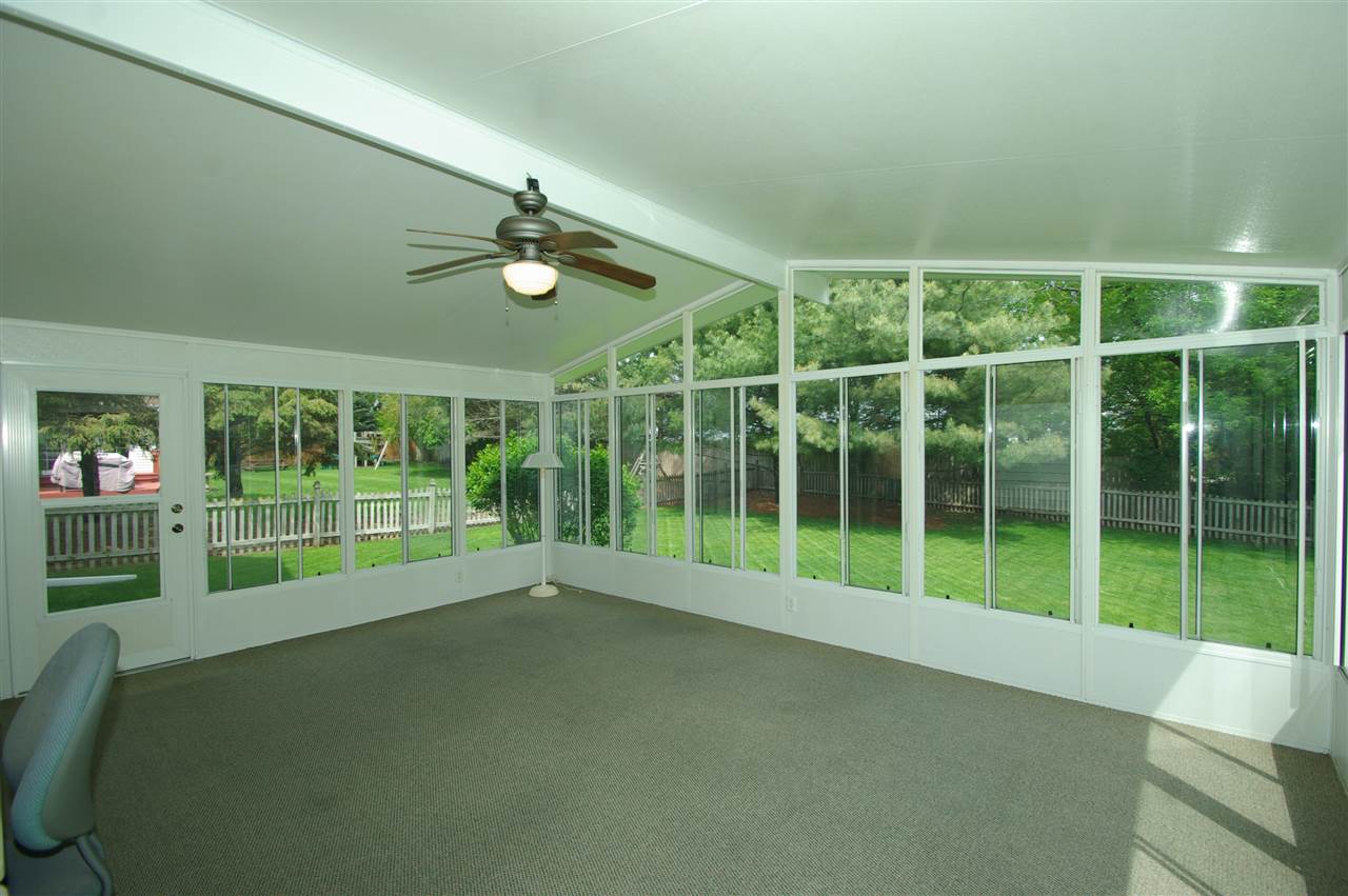 7254 Sentinel Road Rockford, IL 61107 - Photo 13 of 25 a view of empty room with floor to ceiling window