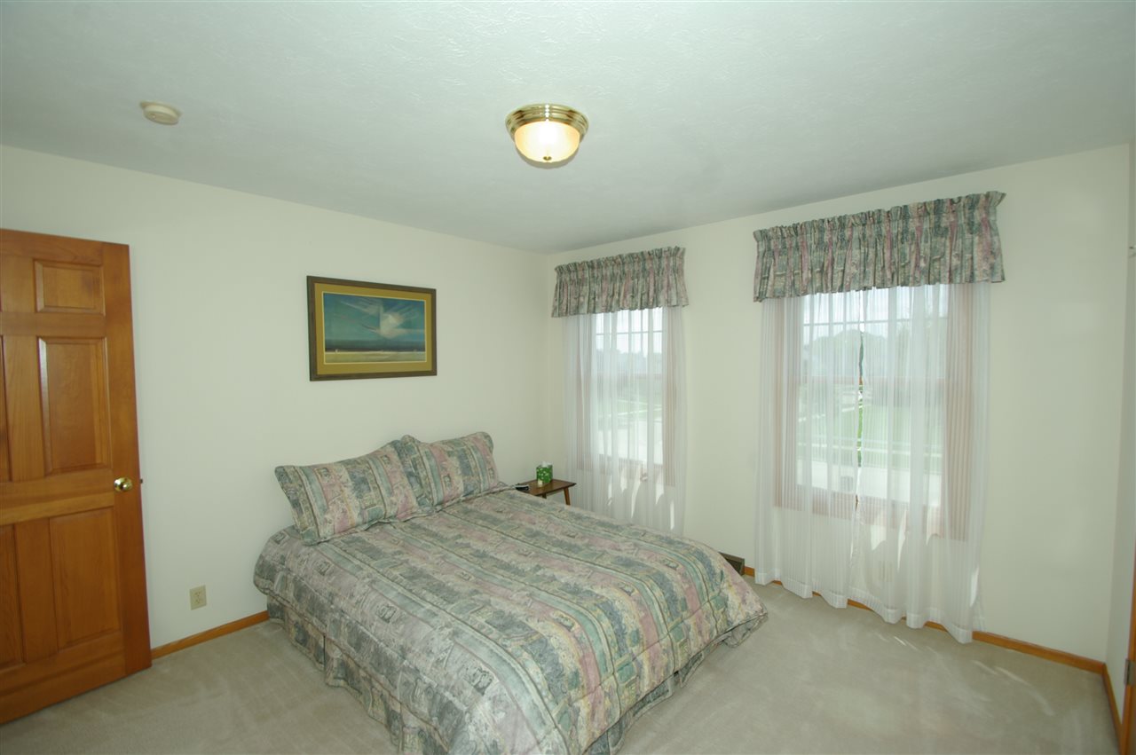 7254 Sentinel Road Rockford, IL 61107 - Photo 20 of 25 a bedroom with a bed and a window
