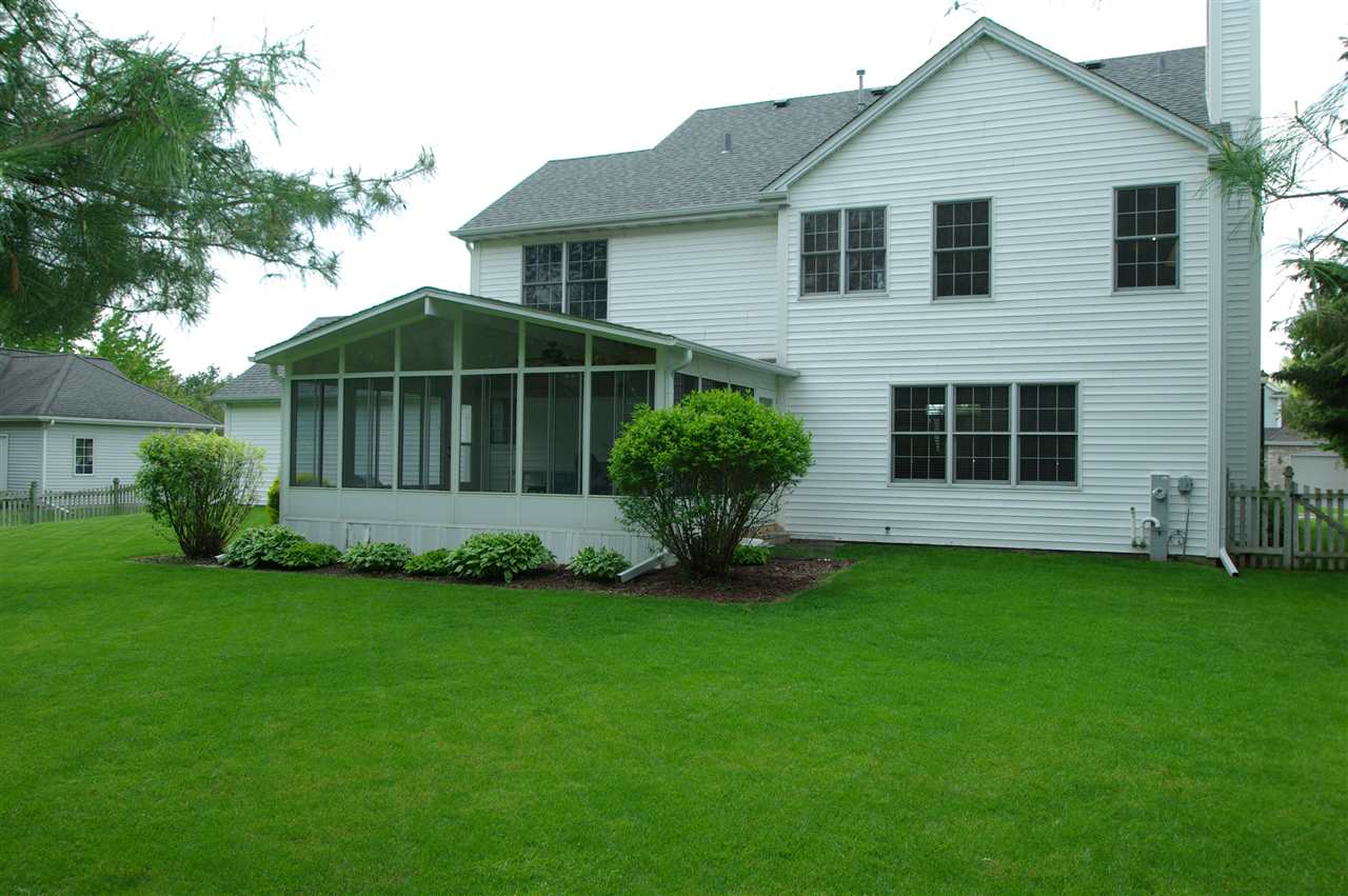 7254 Sentinel Road Rockford, IL 61107 - Photo 22 of 25 a view of a house with a yard