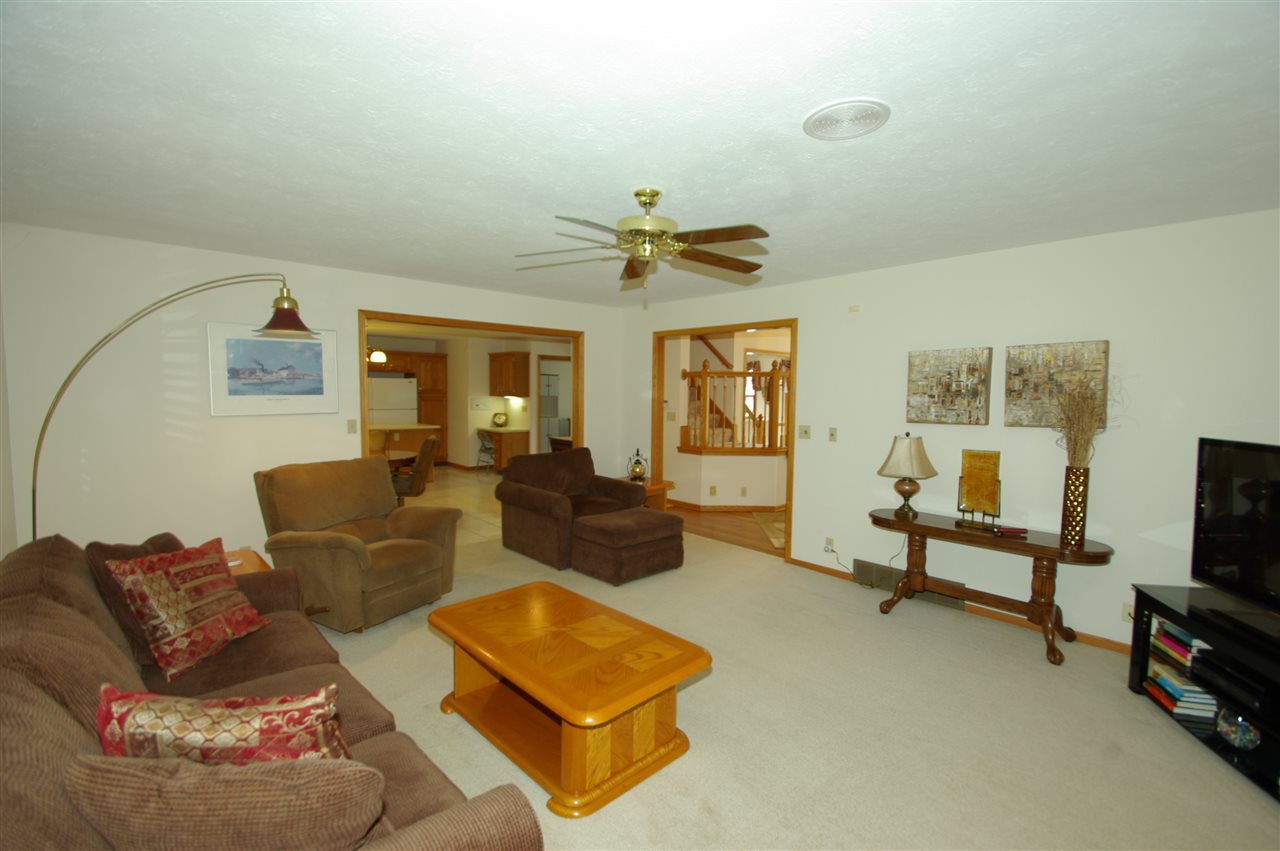 7254 Sentinel Road Rockford, IL 61107 - Photo 4 of 25 a living room with furniture and a flat screen tv