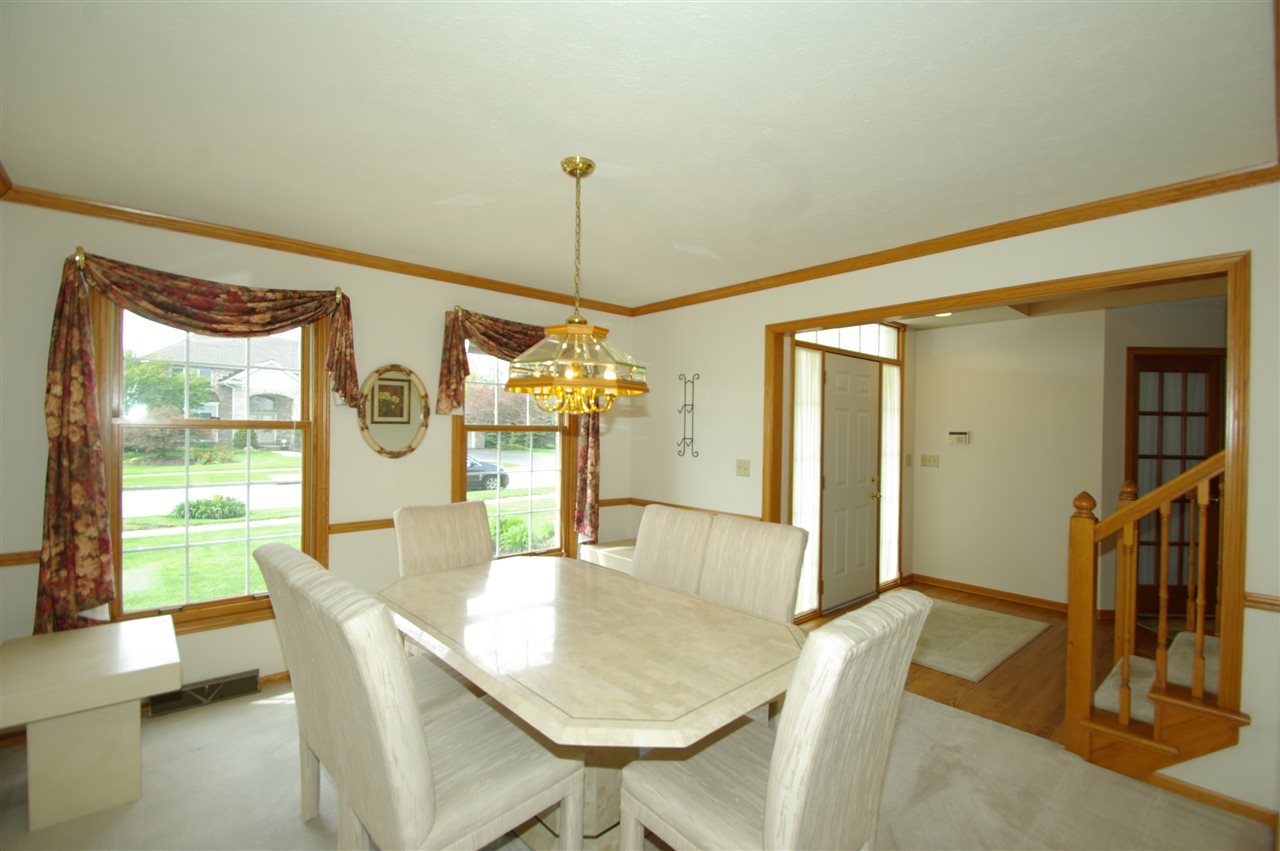 7254 Sentinel Road Rockford, IL 61107 - Photo 10 of 25 a dining room with furniture and window