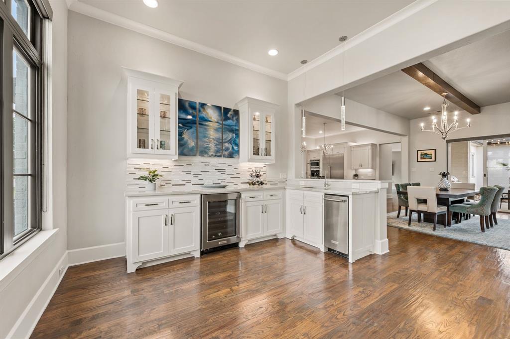 809 Legacy Trail Colleyville, TX 76034 - Photo 11 of 40 a kitchen with white cabinets and appliances