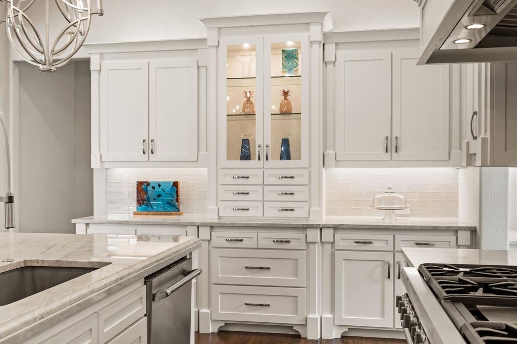 809 Legacy Trail Colleyville, TX 76034 - Photo 15 of 40 a kitchen with white cabinets and appliances