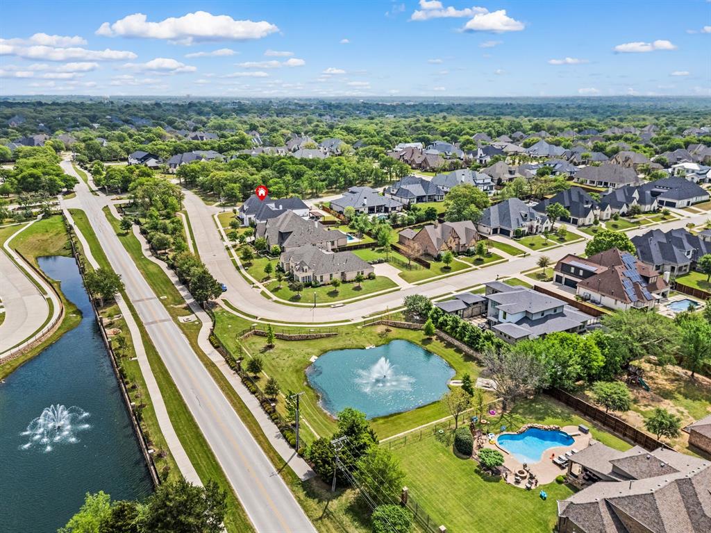 809 Legacy Trail Colleyville, TX 76034 - Photo 34 of 40 an aerial view of residential houses with outdoor space and swimming pool