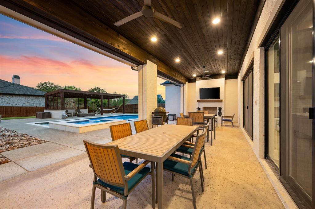 809 Legacy Trail Colleyville, TX 76034 - Photo 35 of 40 a view of an outdoor dining space with furniture