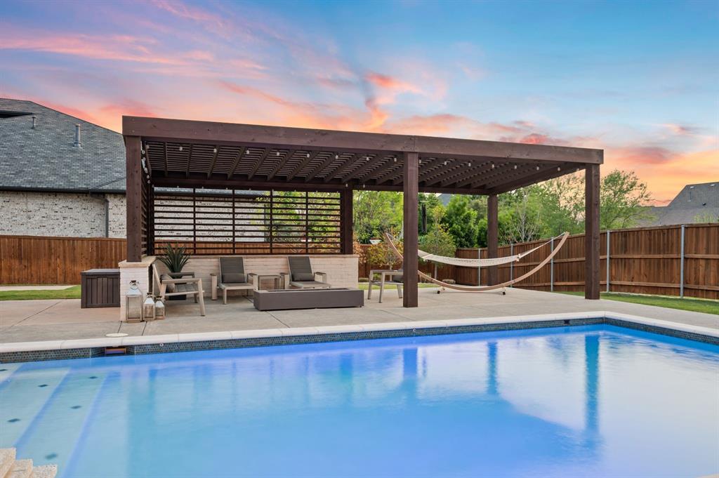 809 Legacy Trail Colleyville, TX 76034 - Photo 39 of 40 a view of swimming pool with outdoor seating