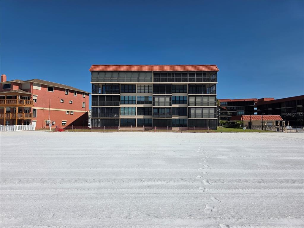 a view of a house with a large window