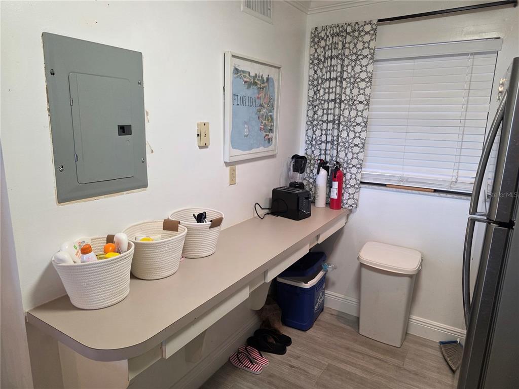 17580 Gulf Boulevard, Unit 311 Redington Shores, FL 33708 - Photo 30 of 34 a bathroom with a sink and a mirror