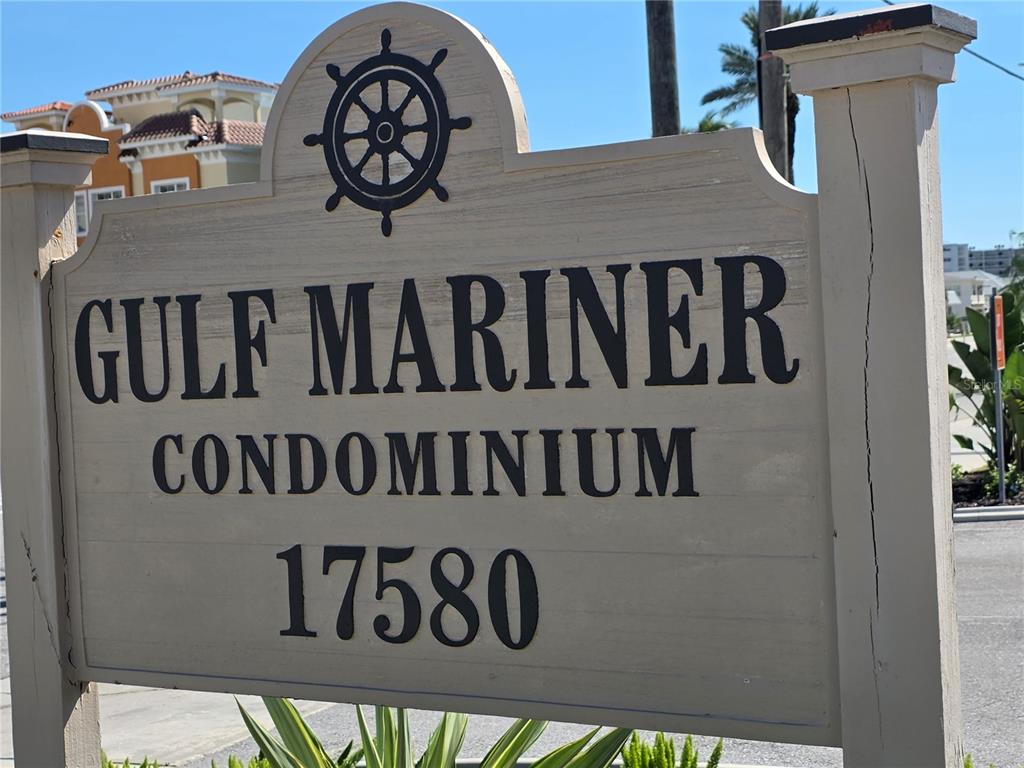 17580 Gulf Boulevard, Unit 311 Redington Shores, FL 33708 - Photo 33 of 34 a front of a wooden building