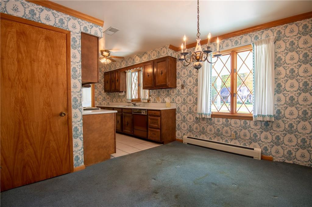 3475 Lamor Road Hermitage, PA 16148 - Photo 8 of 25 DINING SPACE WITH DOOR TO BASEMENT