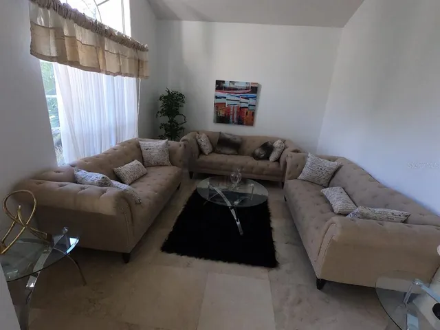a view of a dining room with furniture
