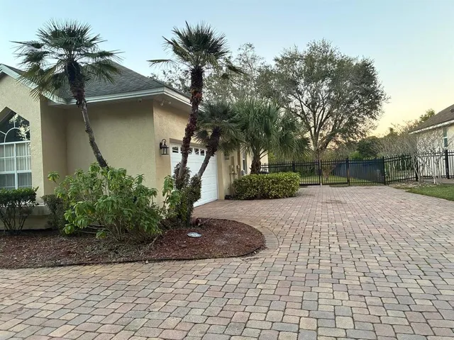 a house with a tree in front of it