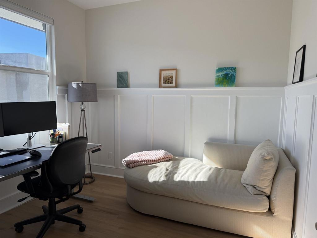 10431 Newbliss Way San Diego, CA 92126 - Photo 5 of 7 a living room with furniture and a chair