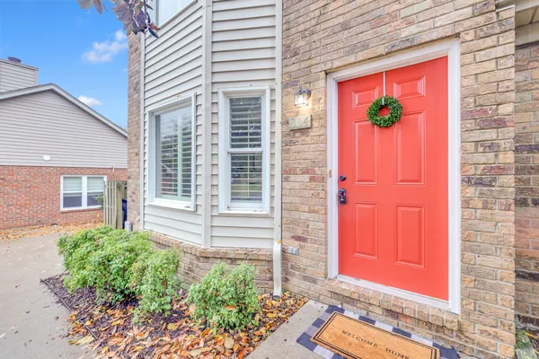 a view of a entryway door front of a house